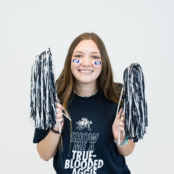 navy and white fan gear pom poms